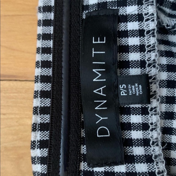 checkered dynamite romper has pockets and a tie up belt - Picture 2 of 2